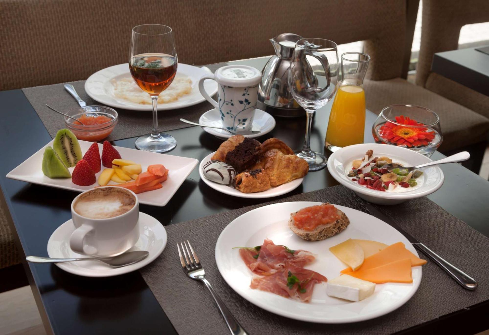 Nh Collection Santiago De Compostela Hotel Exterior photo A continental breakfast